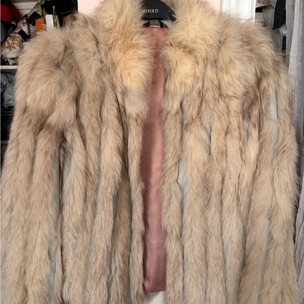Real fur and leather vintage jacket, size small. In good condition.